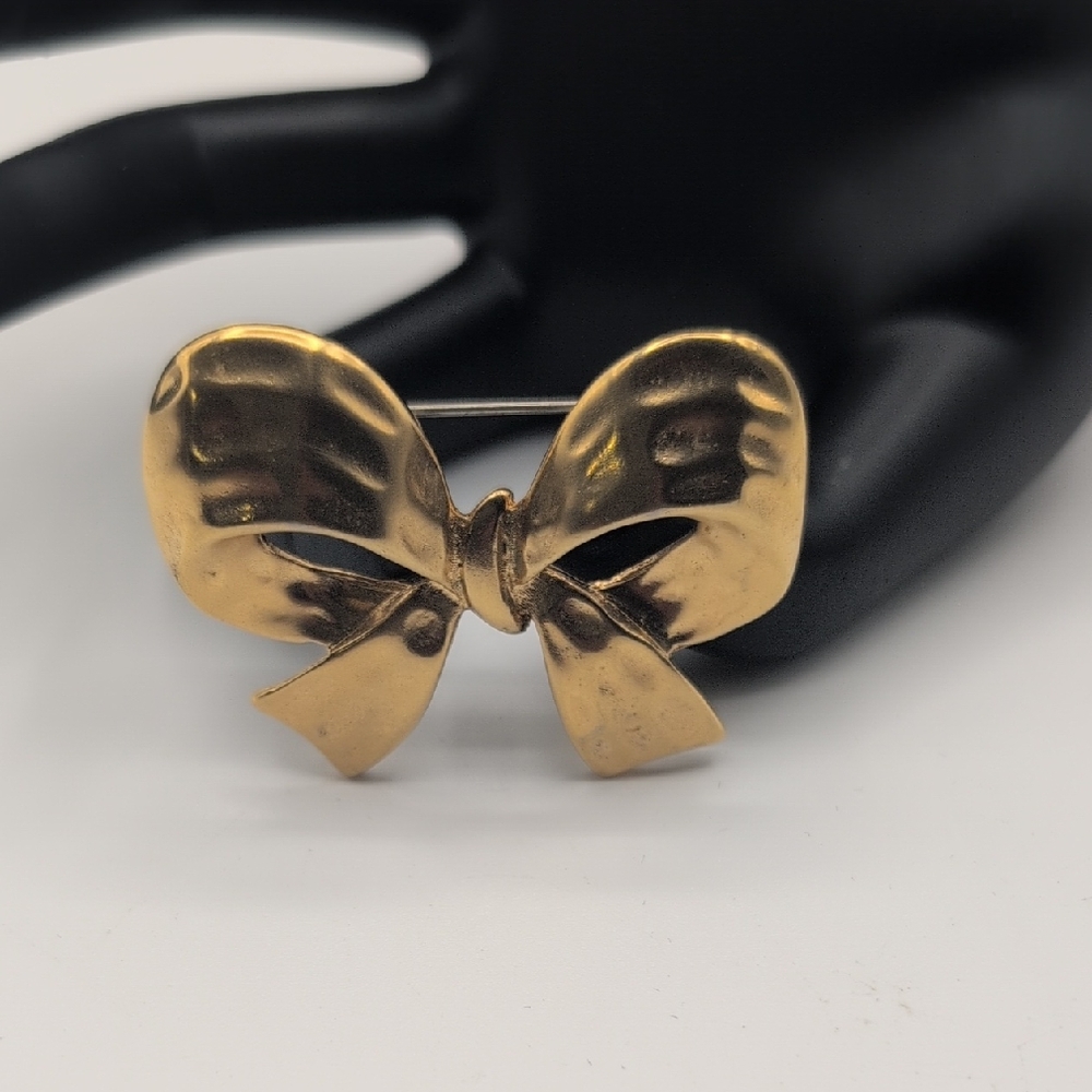 Elegant Gold Toned Bow Brooch